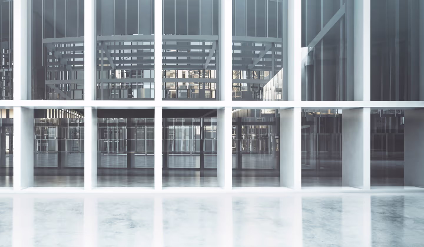 Glass fa&ccedil;ade and colonnade of a modern office building